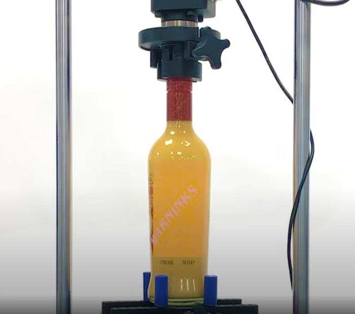 Mecmesin puts egg nog ROPP cap through a torque test